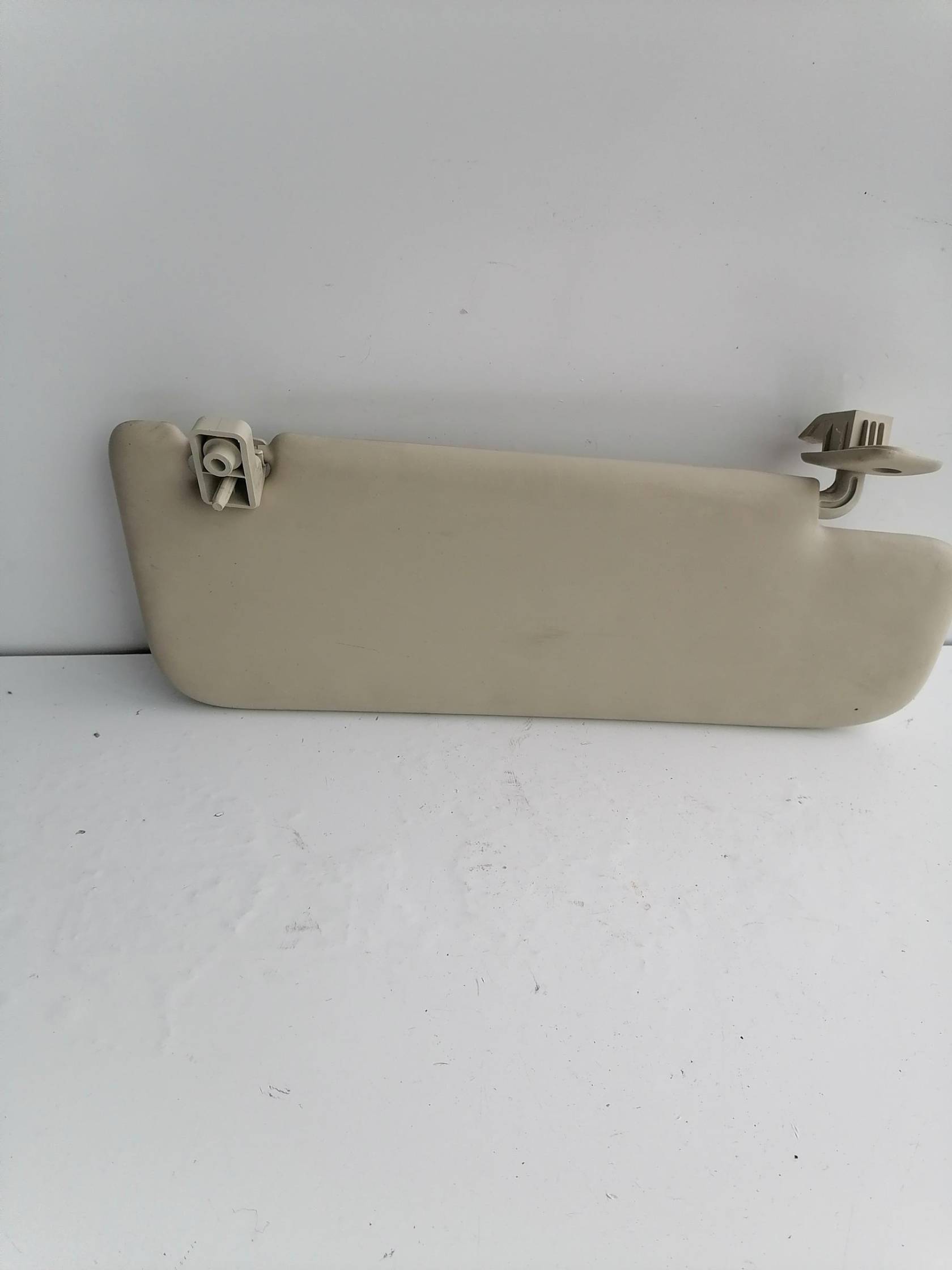 Aletta parasole parabrezza sx.